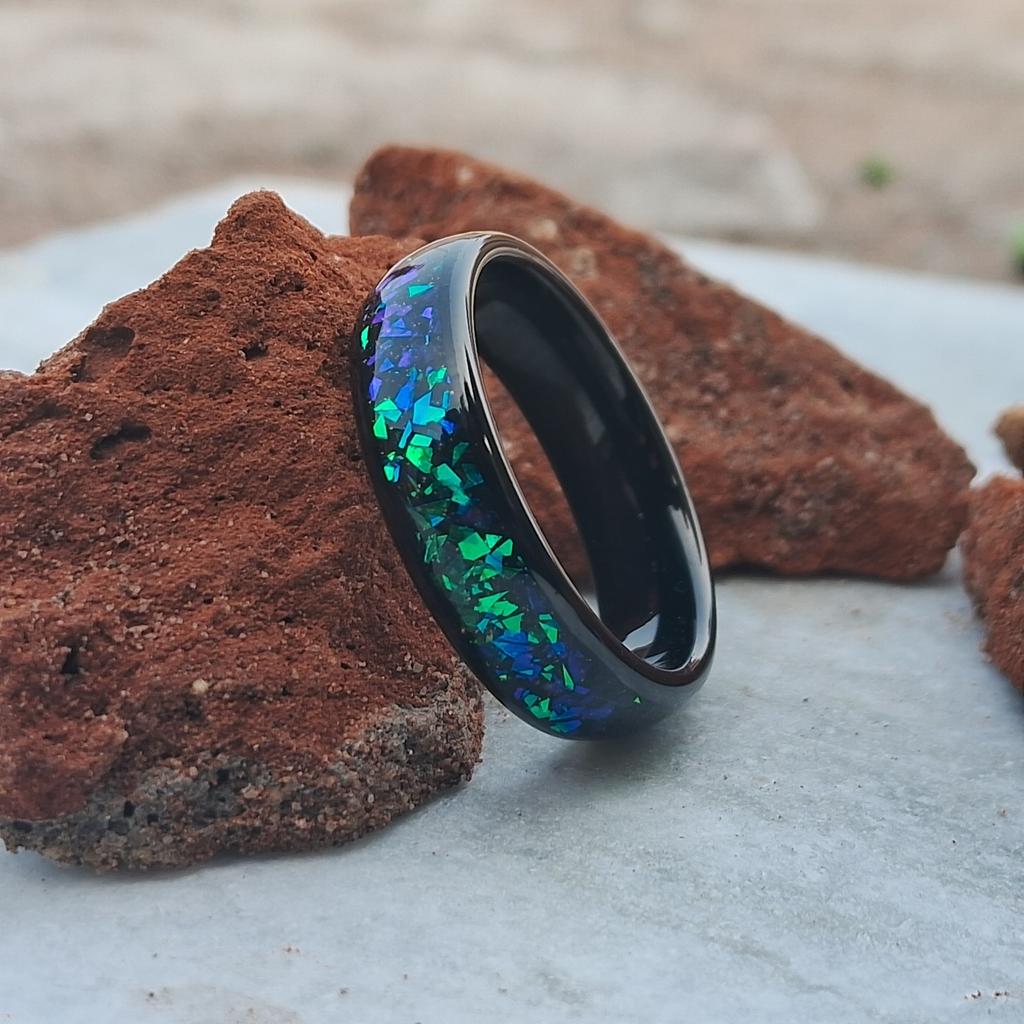 This 6mm Men's Tungsten Ring features a polished finish and stunning galaxy created opal inlay, offering a unique and stylish accessory
