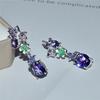 Изысканные серьги. Выполнены в виде бабочки на цветке и украшены фиолетовыми аметистами. Элегантное вечернее и свадебное украшение