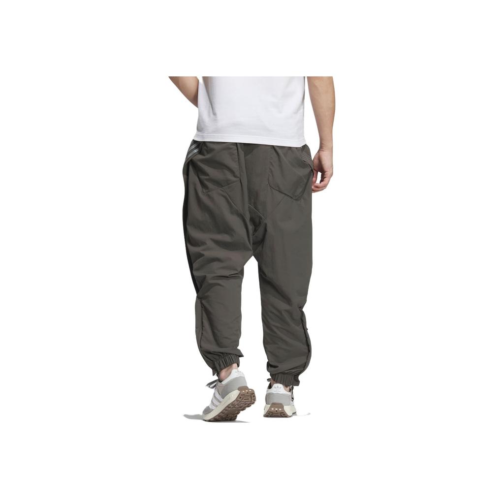 Adidas Коллаборация Originals X Hamcus, осень-зима 23, три полоски, застежка на пуговицы сбоку, спортивные длинные брюки унисекс, темно-армейско-зеленые IX7078