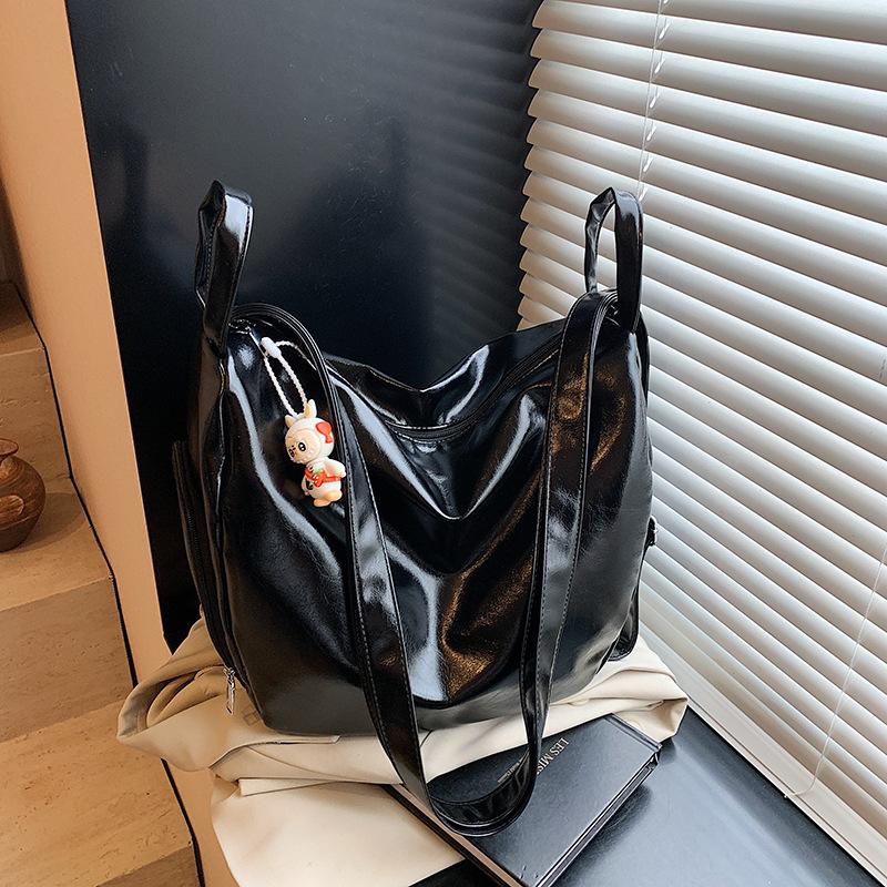 Женская сумка-тоут большой вместимости, новая нишевая сумка-мессенджер через плечо, сумка для通勤, повседневный многофункциональный рюкзак