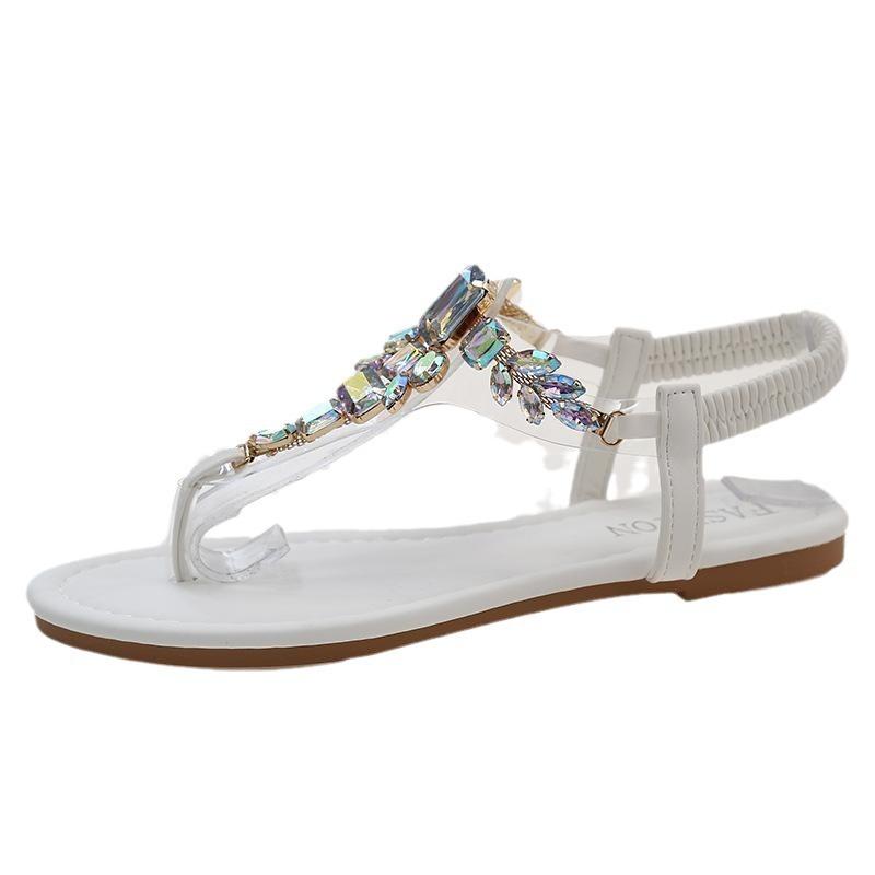 Европейские и американские сандалии больших размеров женские лето 2025 новые на плоской подошве универсальные нескользящие модные сандалии-елочки со стразами женские
