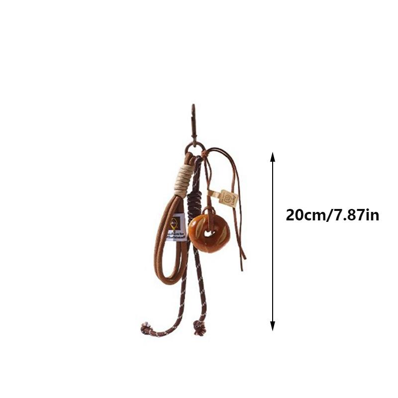 Yogodlns Подвеска в виде рогалика с щелочной водой, симпатичное улыбающееся лицо, плетеная веревочная сумка, аксессуар ручной работы, модный подарок