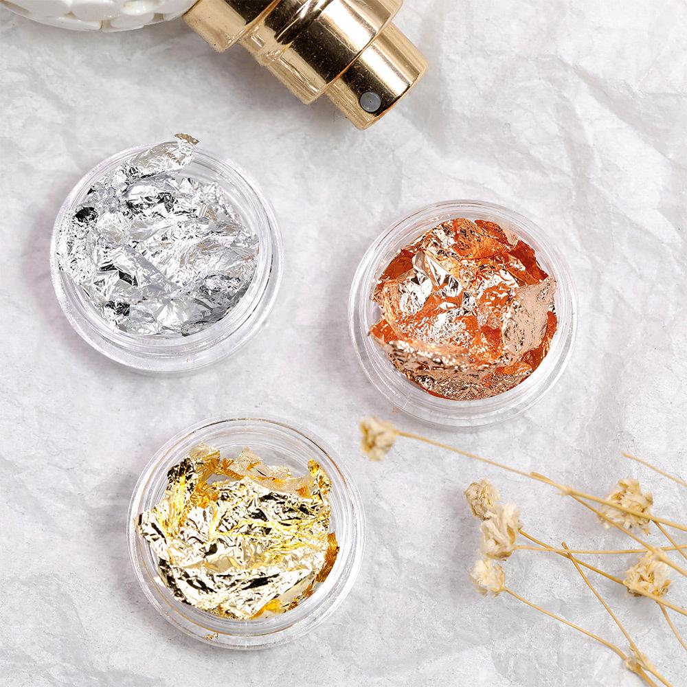Wholesale Gold and Silver Nail Art Stickers with Colored Tin Foil Fragments.