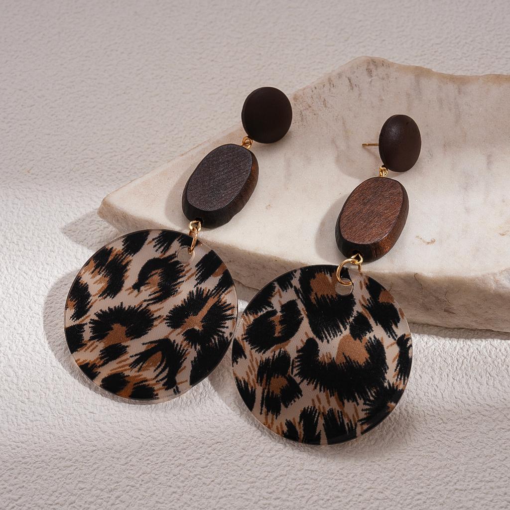 Модные серьги-подвески для женщин