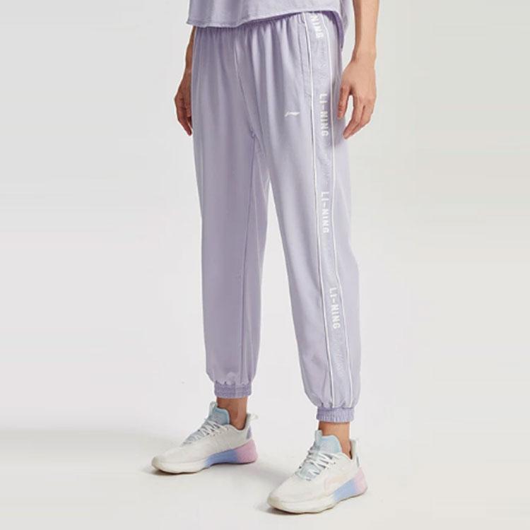 Женские спортивные брюки Li Ning Training Series, однотонные, свободные, с принтом логотипа сбоку, светло-фиолетовые, AYKR136-3