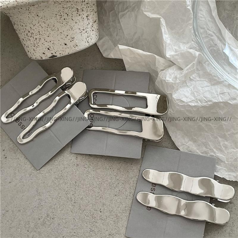 Design sensitive metal silver wave line hairclip with geometric hollow alloy duckbill clips and new bangs clip hair accessories