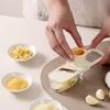3 in 1 Garlic Grinder Multifunctional Kitchen Tool Manual Garlic Mincer Slicer and Peeler with Storage Container for Home Cooking
