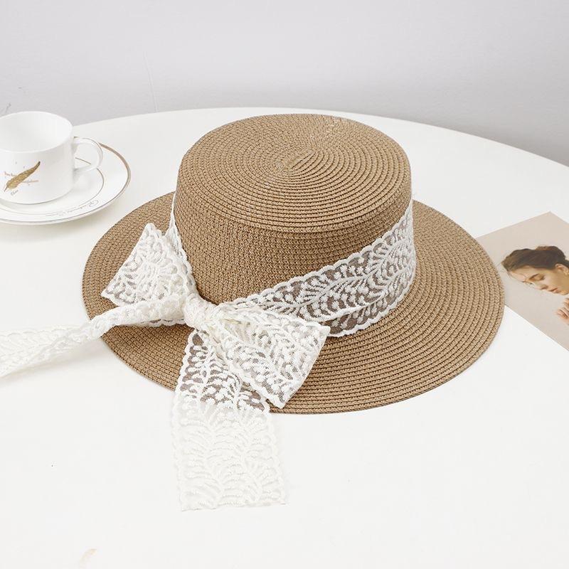 Bow lace strap hat women's outdoor travel flat top straw hat sunshade travel sunscreen big brim top hat