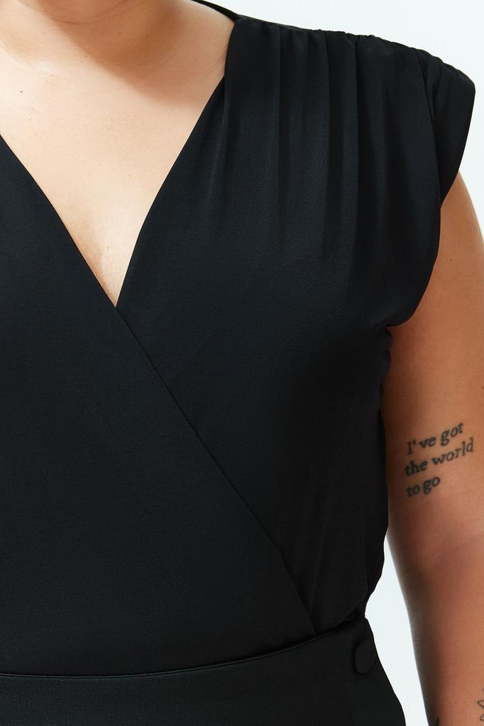 Женская стильная трикотажная блузка больших размеров с черной подкладкой, двубортный воротник и эластичная застежка на кнопках