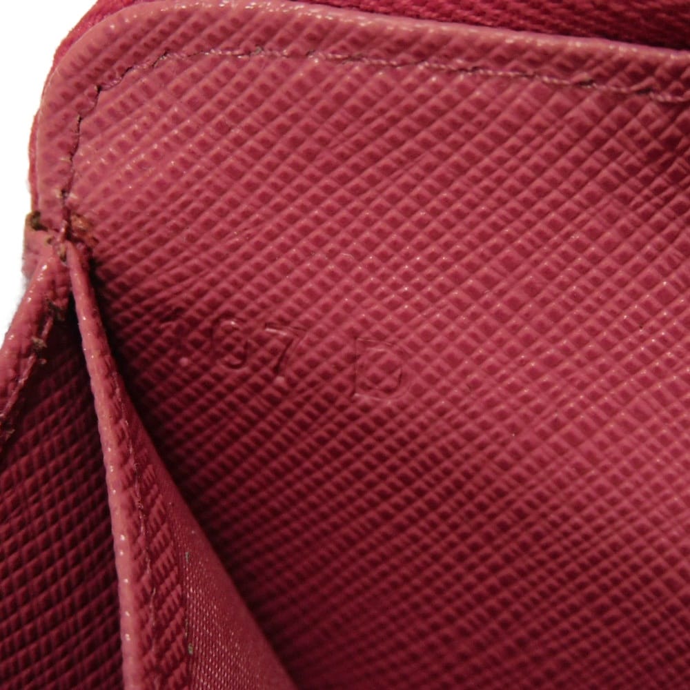 Подержанный 11569 Кошелек для монет Saffiano 1MM268 QHH F0505 7943 Розовый Картхолдер на молнии с треугольным логотипом Peonia Женский от