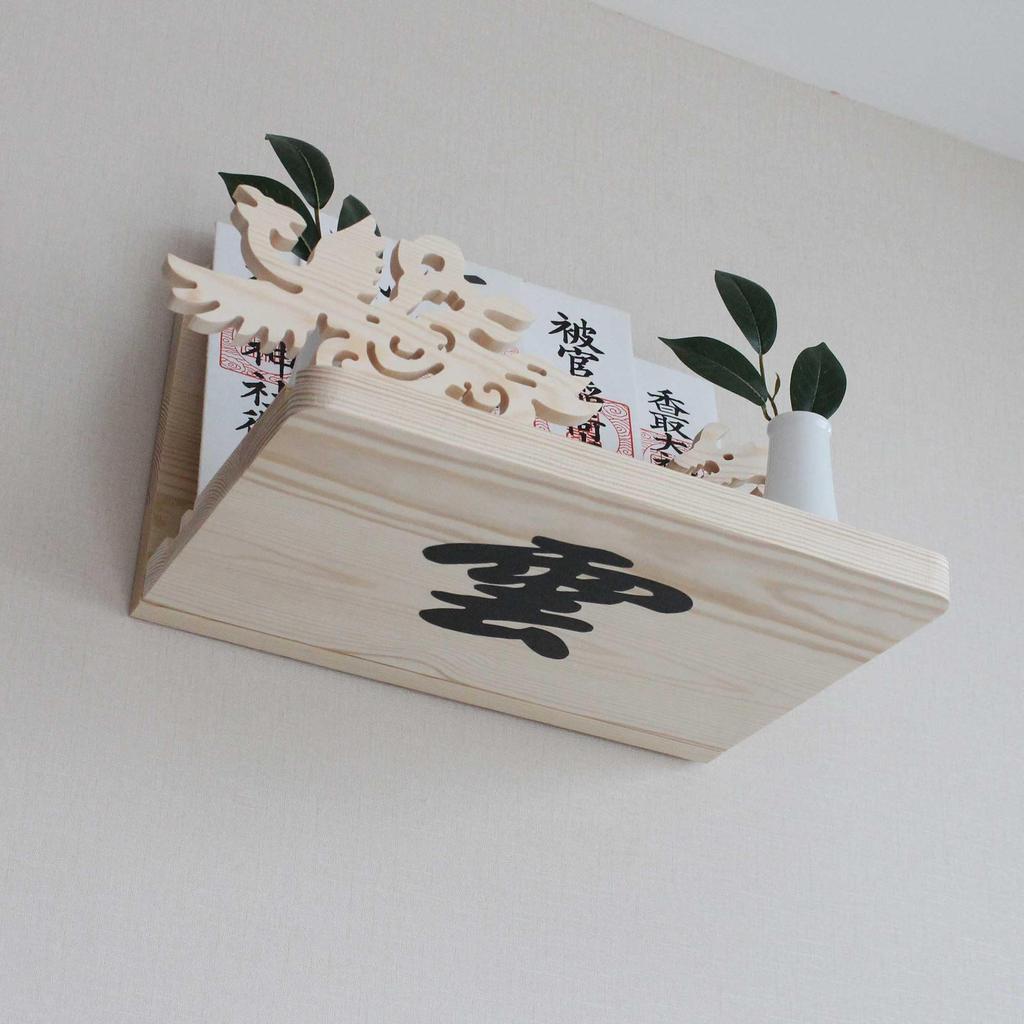 Shinto altar, amulet stand, wall-mounted, with relief carvings of a three-legged bird, auspicious clouds, and the moon, suitable for ancestral shrines
