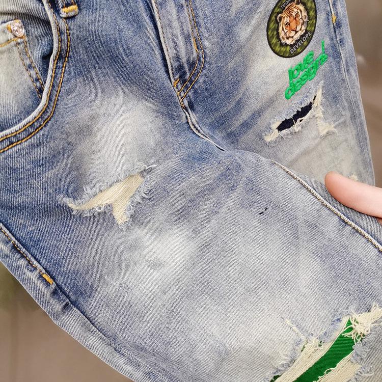 Модные мужские облегающие джинсы с вышивкой и стильными рваными деталями