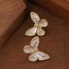 Korean version fashionable simple small fresh white dripping oil smart butterfly stud earrings light luxury temperament high-end earrings