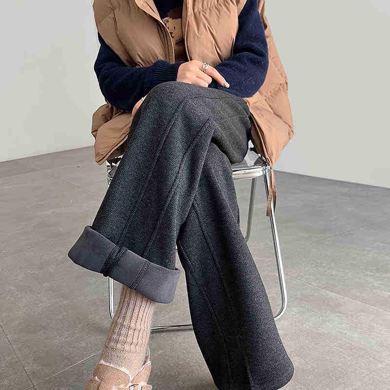 Женские брюки палаццо из шерсти в елочку с разрезами - Коллекция весна/лето 2025