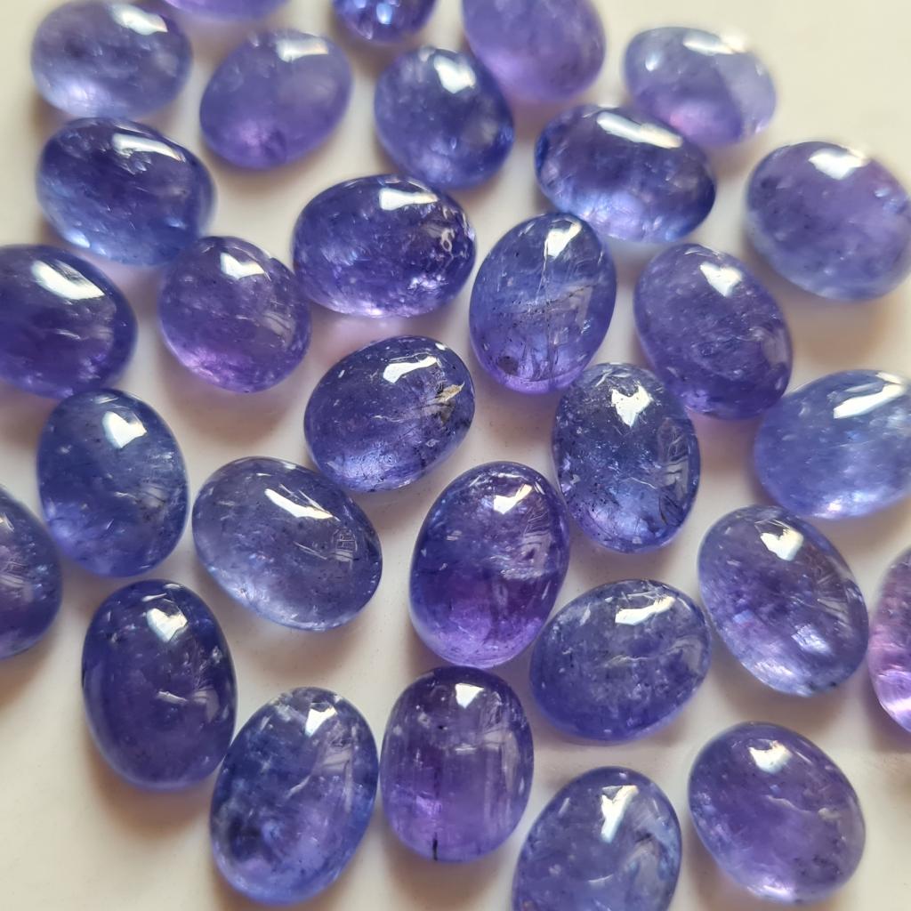 Натуральный танзанит кабошон овальной формы калиброванный размер хорошее качество танзанит россыпью камни для изготовления ювелирных изделий.