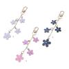 Elegant Flower Keychain Sturdy Alloy Bag Charm Fashion Accessory for Trendy Women Ladies Waterproof Oil Drop Designs