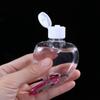 Refillable Travel Perfume Lotion Jar Empty Container Bottle Leaf Heart Spray Bottle With Metal Hook