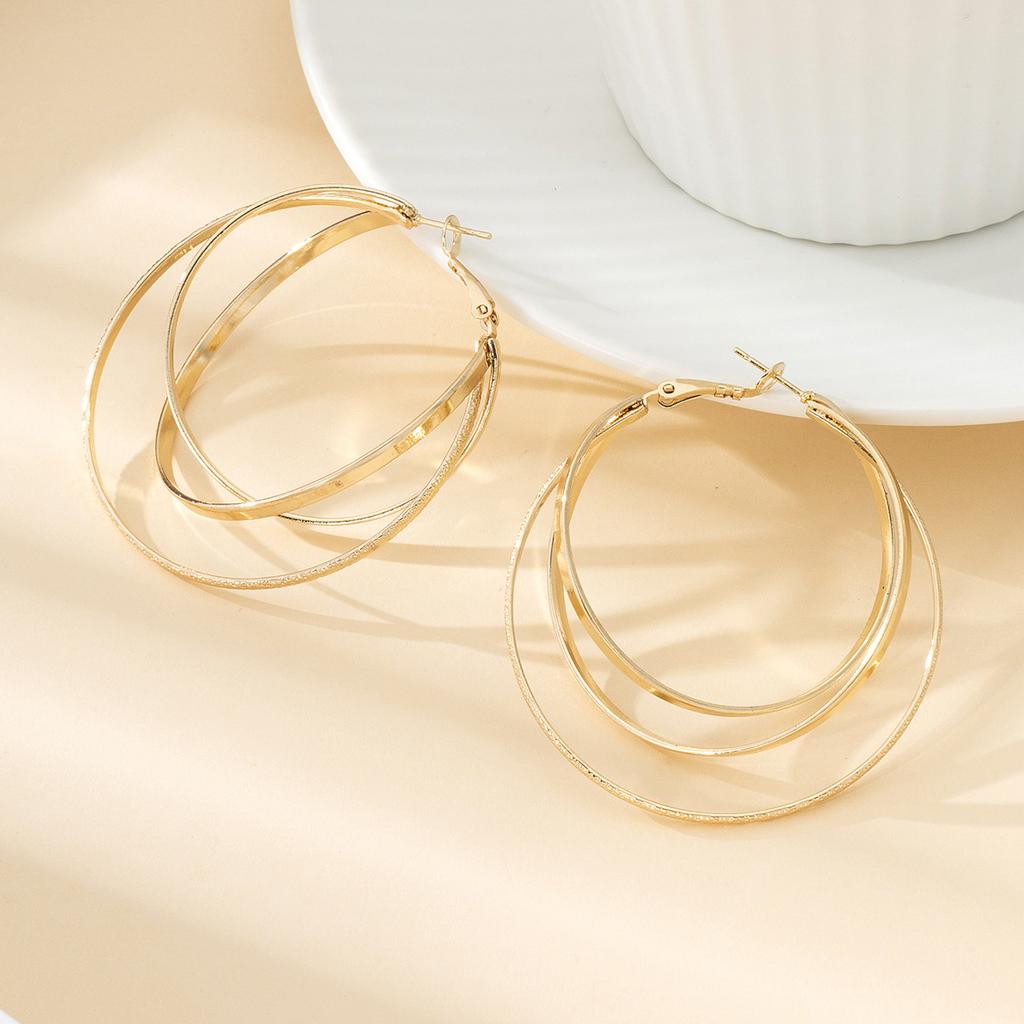 Простые многослойные крестообразные серьги-кольца для женщин