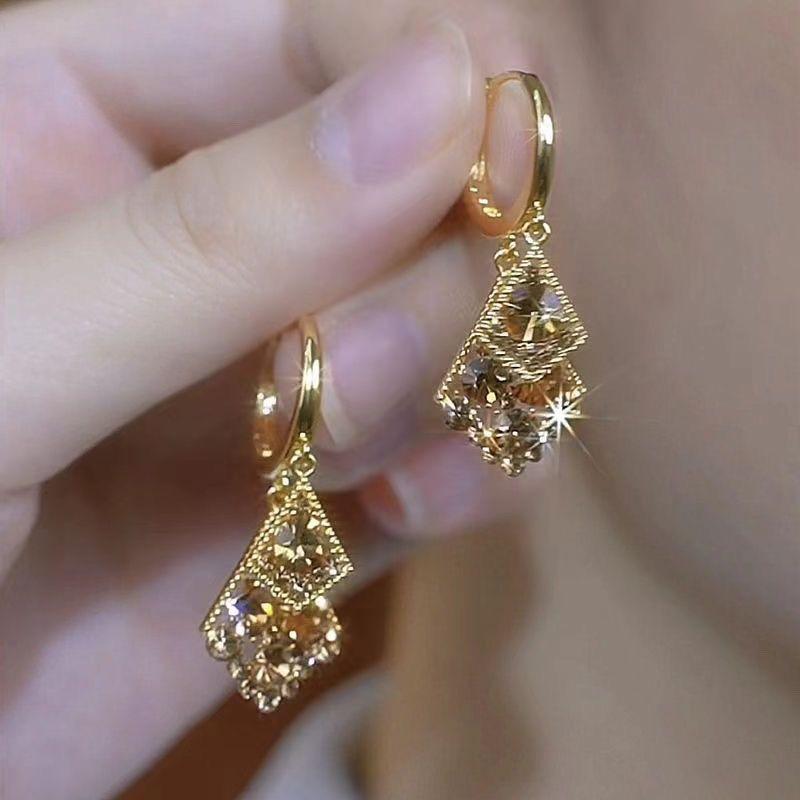 Элегантные двухслойные серьги из коричневого циркония: Легкая роскошь, изысканный дизайн для женщин