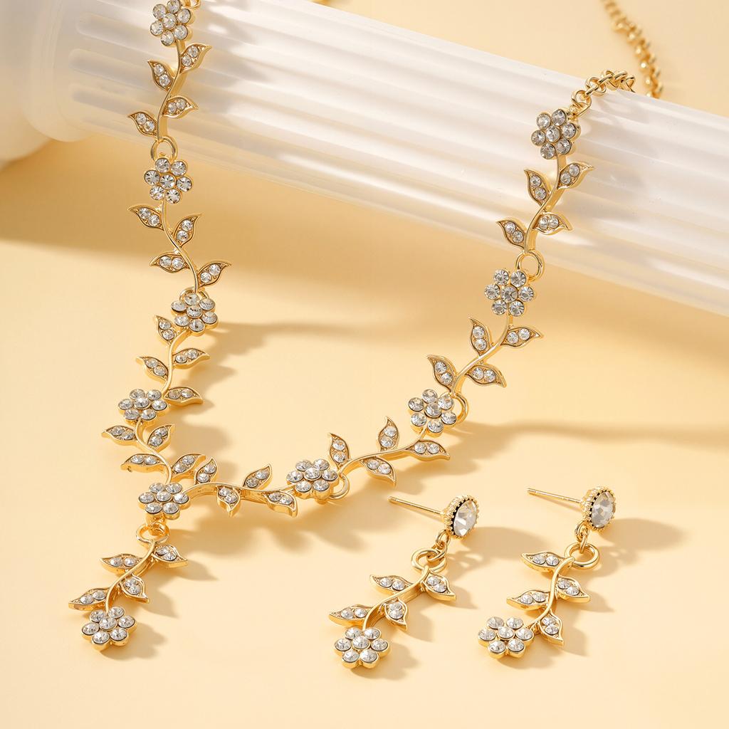 Popular Leaf and Flower Rhinestone Two-Piece Set Elegant dress paired with diamond-studded necklace and earrings for women