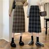Осенние и зимние женские юбки. Твидовая клетчатая юбка средней длины с высокой талией. Прямая юбка средней длины в открытую клетку средней длины.