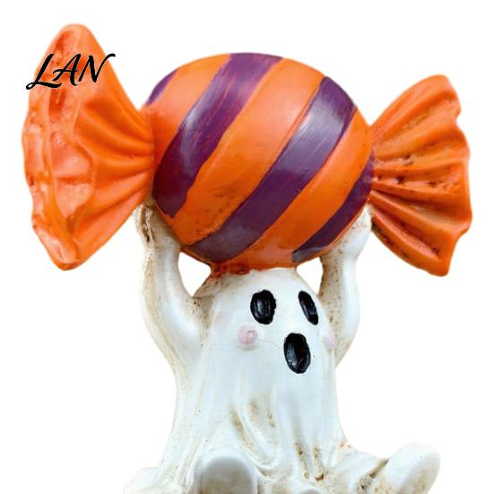 Whimsical Ghost Statue Halloween Figurine, Cute Sitting on Pumpkin Holding Candy Souvenir Gift Statue, Spooky Resin Table Ornament for Indoor