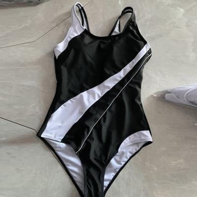 Женский цельный модный спортивный однотонный купальник (С накладкой на грудь без стального бюстгальтера)