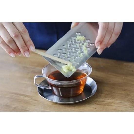 Tomita-style grater 2-piece set Light fluffy grated daikon Retains moisture concentrates flavor Stainless steel dishwasher safe