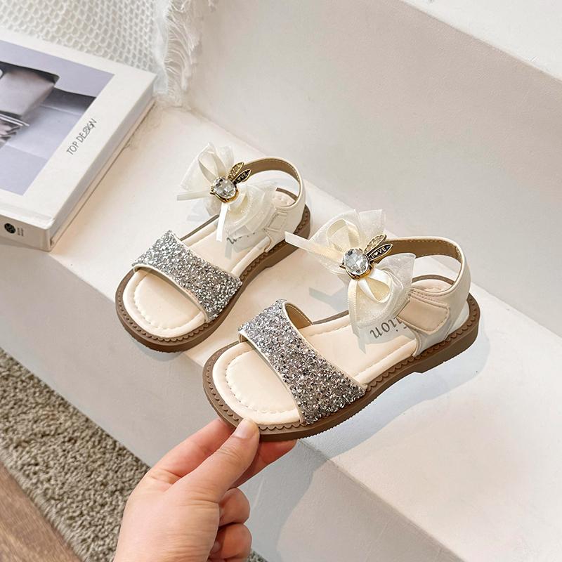 Сандалии принцессы с блестками для девочек, простые детские летние пляжные модные детские блестящие кожаные сандалии с бантом 2024 года, новинка