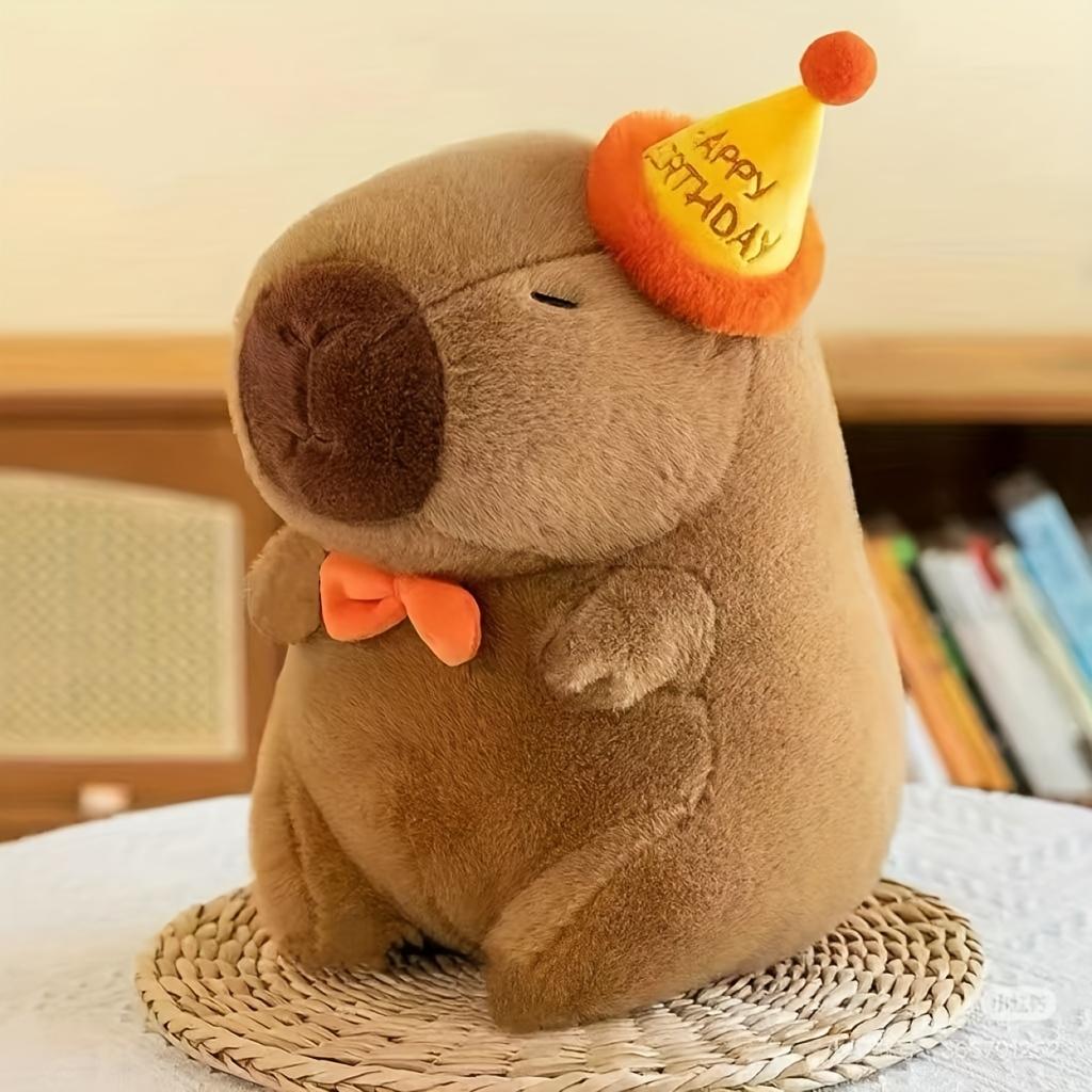 Очаровательная плюшевая игрушка капибара с праздничной шапочкой и галстуком-бабочкой – мягкая игрушка для собак всех пород, идеальный компаньон для игр в помещении