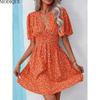 MODIQUE 2025 Summer New Women's Sexy Casual Floral Printing Ruffles Elastic Waist Short Dress Ladies X-Line Hot Batwing Sleeve V-Neck Dress