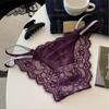 Фиолетовые кружевные стринги с низкой посадкой и бриллиантовыми украшениями