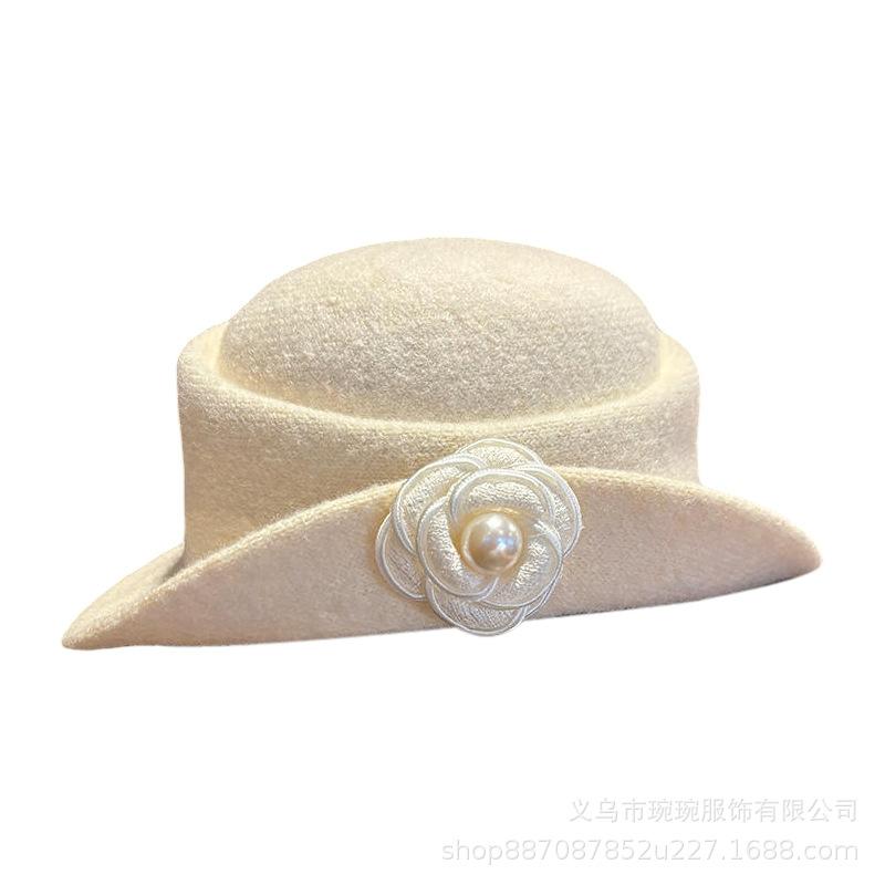 Hepburn style camellia black pearl top hat women's autumn and winter advanced sense thousand gold hat shows small temperament bucket hat