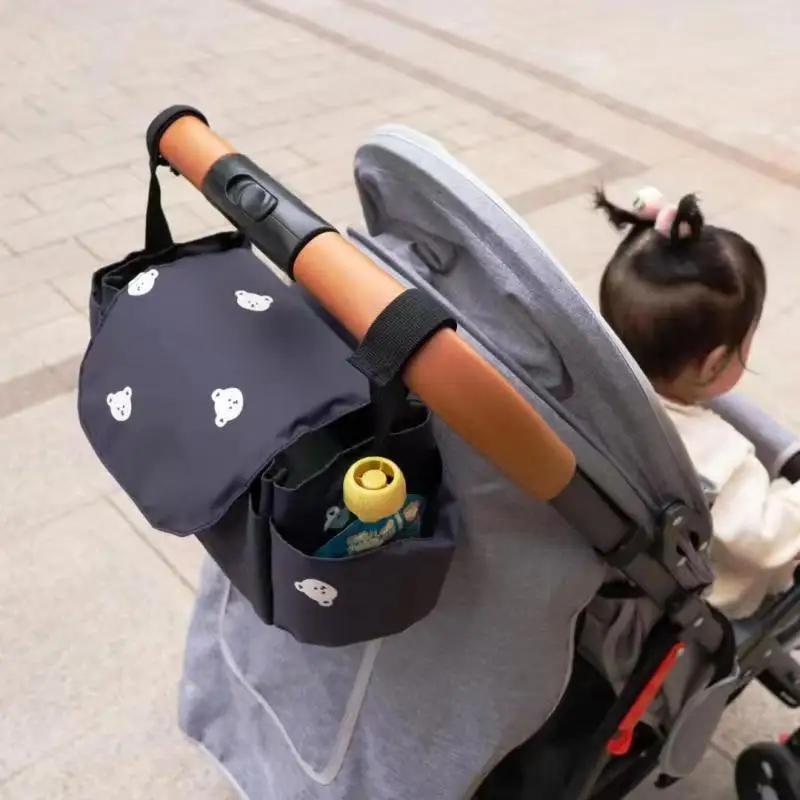 Корейская сумка-мама с мишкой Сумка для детской коляски Органайзер для коляски Мультяшный держатель для бутылочки Аксессуары для детской коляски Подвесная сумка-органайзер Сумка для хранения