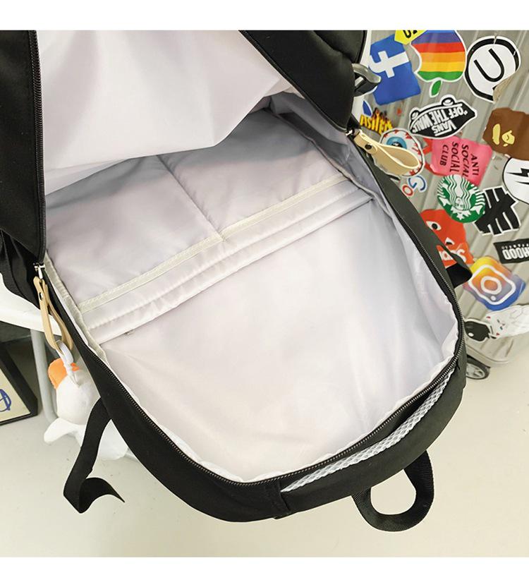 Fashionable Water-Repellent Student Backpack: Trendy High-Capacity Design for Couples