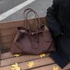 An Autumn and Winter-themed Matte Suede Single-shoulder Handbag, Which Is Casual and Versatile, with a Large Capacity and Designed As a Tote Bag.