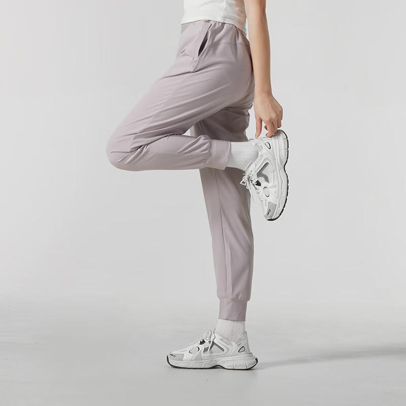 Under Armour Удобные дышащие стильные трикотажные спортивные брюки женские низ розовые фиолетовые 1382727-009