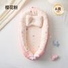 Bed-in-a-bed crib for newborns, designed to soothe sleep and prevent startle reflexes, mimicking the womb, providing a sense of security for the baby