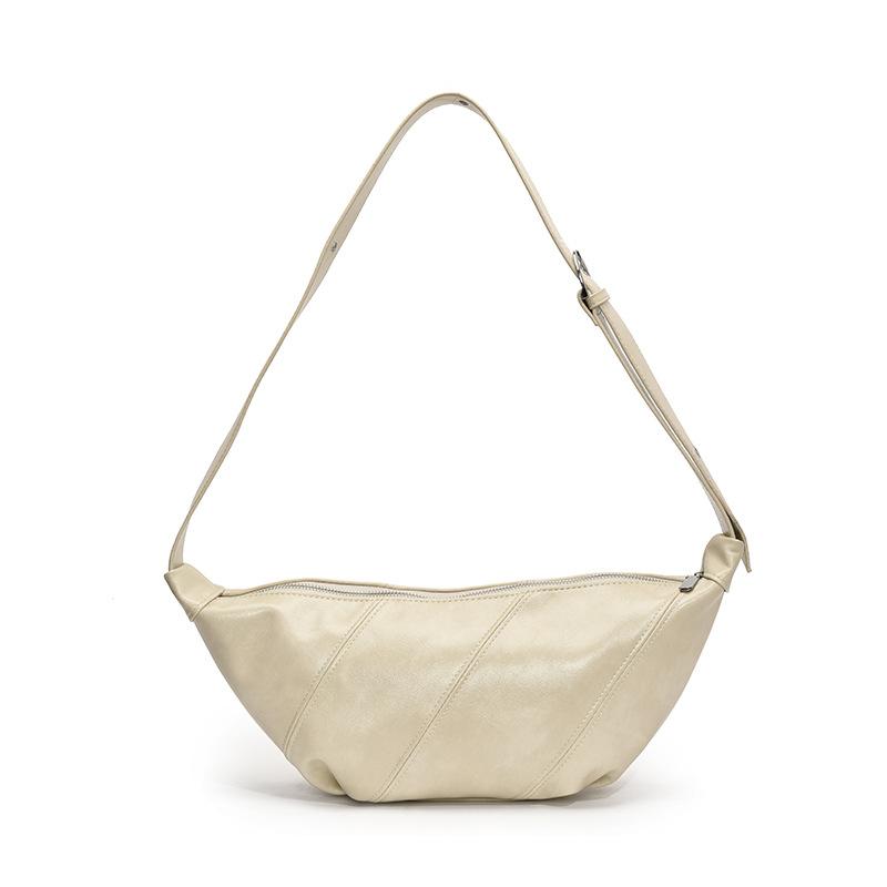 2025 New Casual Simple Hong Kong Style Soft Leather Shoulder Dumpling Bag Fashionable Versatile High Sense Commuter Messenger Women's Bag