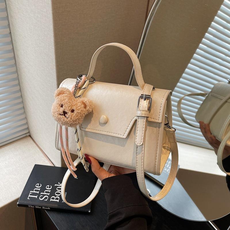 Модная портативная маленькая квадратная сумка женская сумка новая нишевая сумка для通勤 высокого класса универсальная на плечо сумка-мессенджер