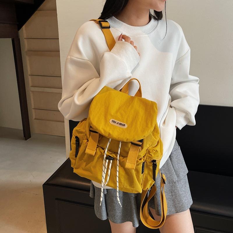 Korean Version of Casual Art Canvas Schoolbag Fashion Nylon Drawstring Backpack 2025 Summer New Fashion Simple Solid Color