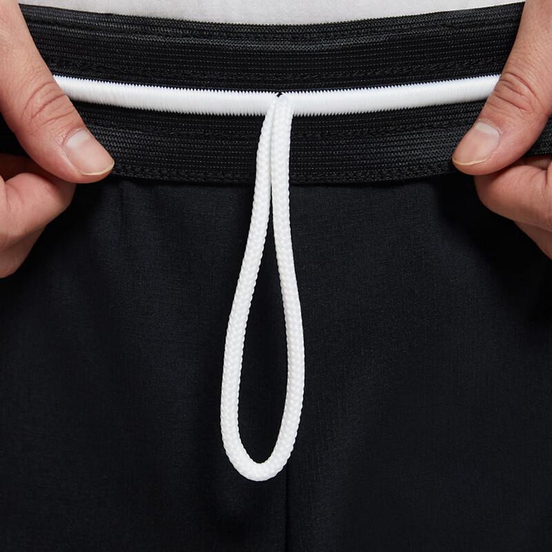 Nike Мужские тканые спортивные брюки свободного кроя, зауженные к низу