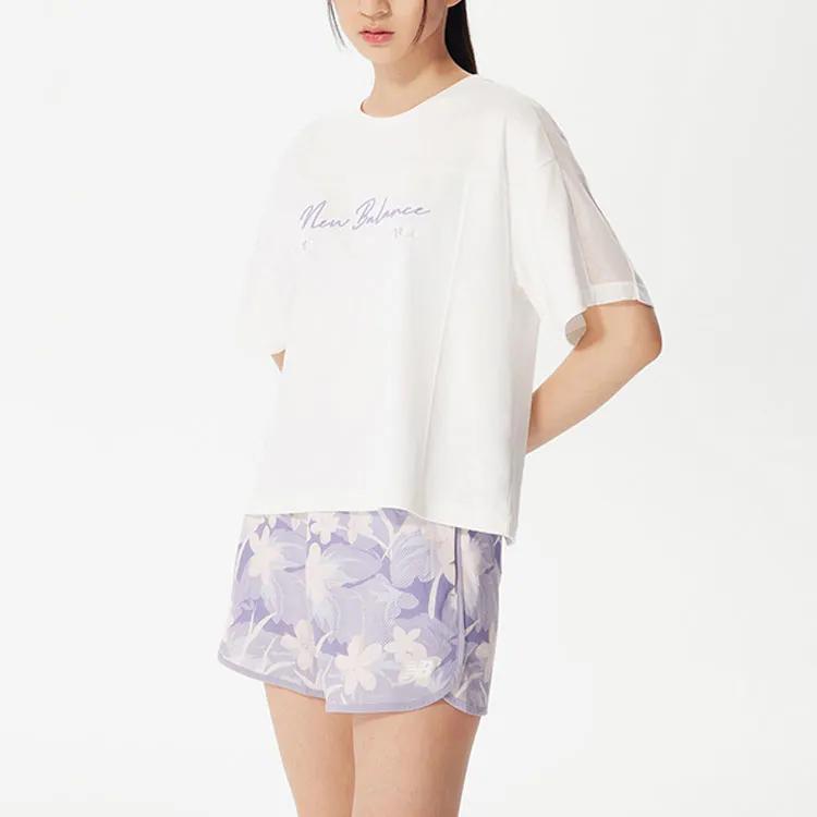 New Balance T Shirts Women's White Crew Neck Moderate Straight Fit (Unisex) T-Shirts 5EC2U672 WT