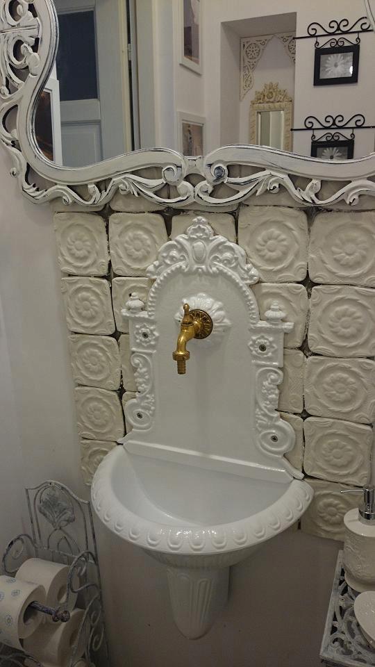 Wall-mounted cast iron garden sink