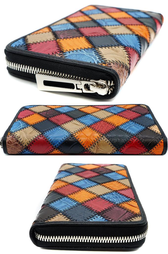 Оранжевый длинный кошелек для мужчин и женщин, изготовленный из цельного куска натуральной кожи крокодила. Имеет золотую круглую застежку-молнию, кошелек для монет, большой