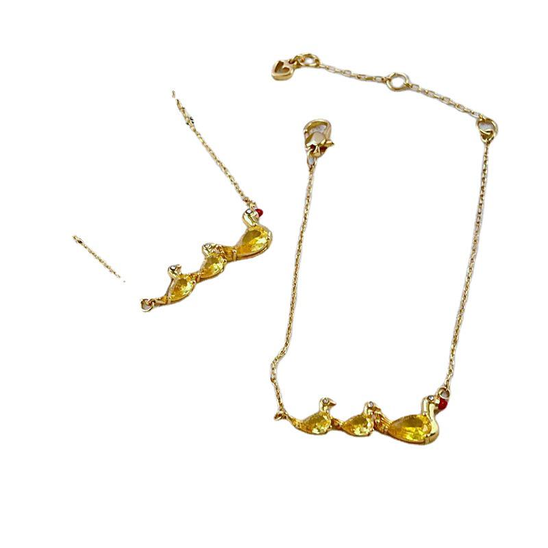 Элегантный набор ожерелья и браслета с желтым утенком, инкрустированным цирконами