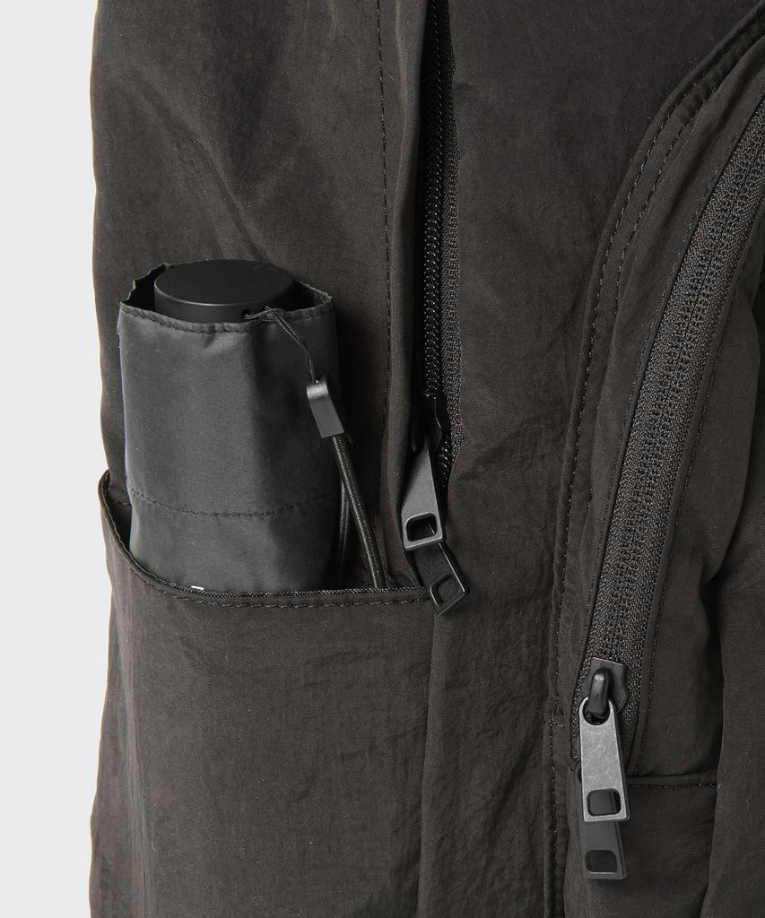 Musinsa Standard Crinkle Round Pocket Backpack [Dark Brown]