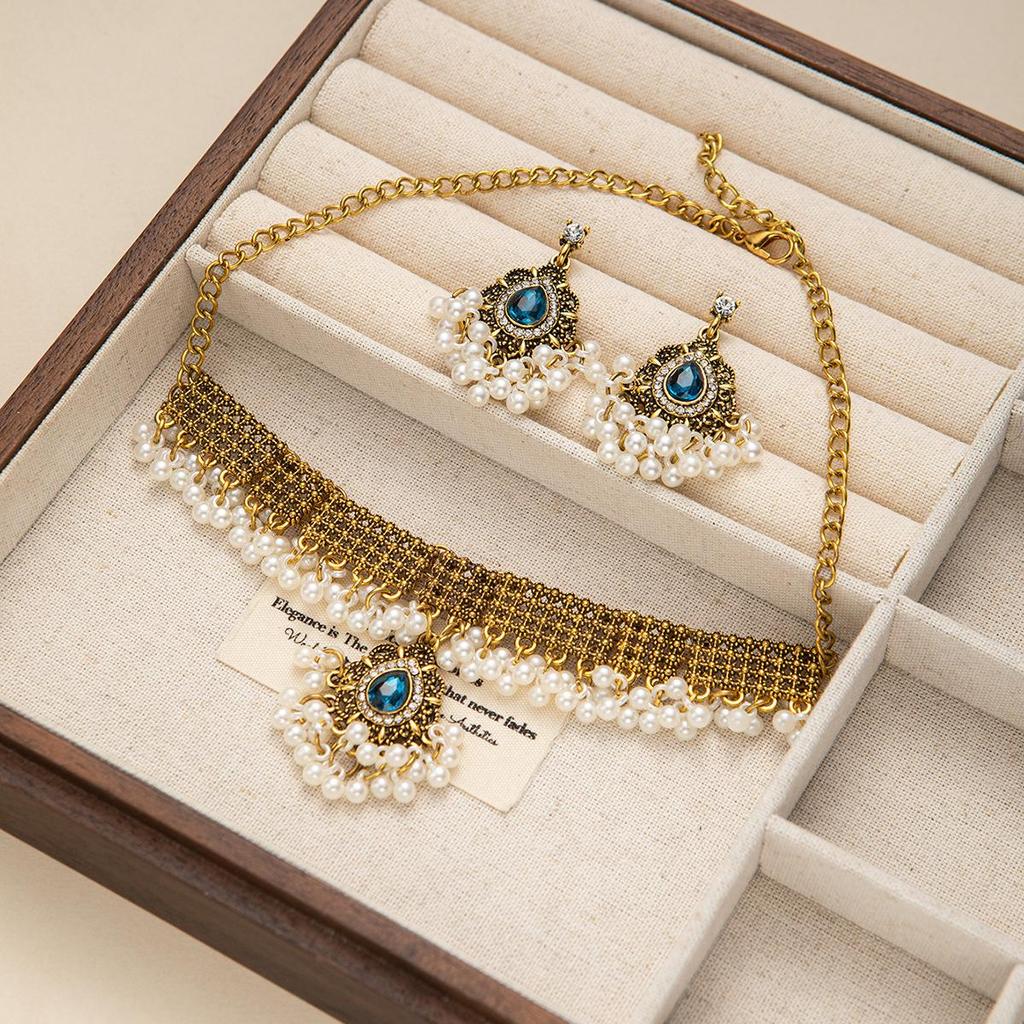 European & American Exotic Style Jewelry Set: Bohemian Clavicle Necklace with Pearls and Tassel Earrings Inlaid with Zircon Diamonds.