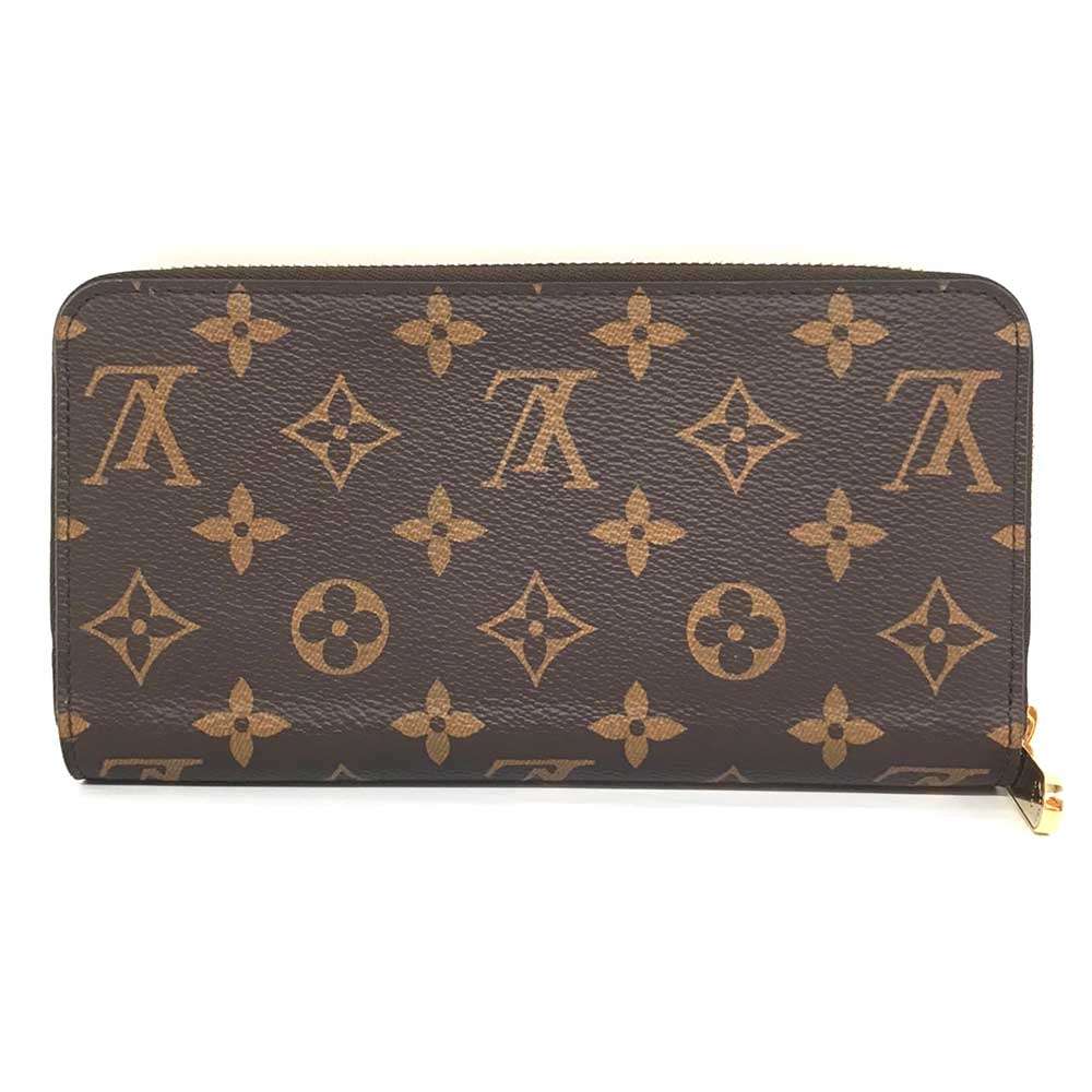 Б/у Кошелек LOUIS VUITTON Канва Monogram унисекс