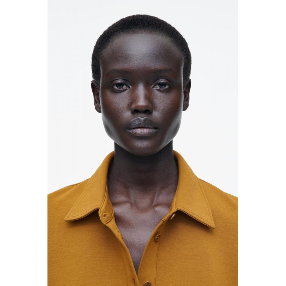 COS Расклешенный хлопковый трикотажный поло из Японии